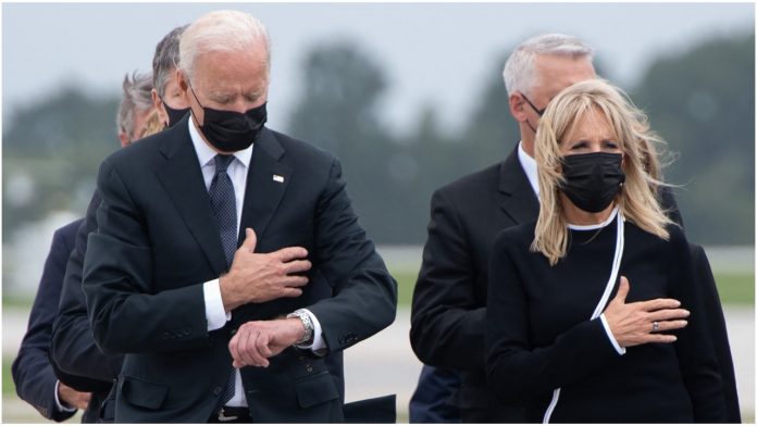 Biden glancing at his watch during ceremony for martyrs invites criticism