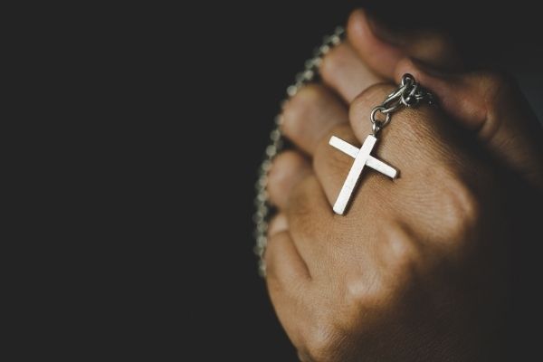 Madras HC orders restoration of a doctor's SC certificate saying merely going to Church or displaying the Cross does not mean she has converted