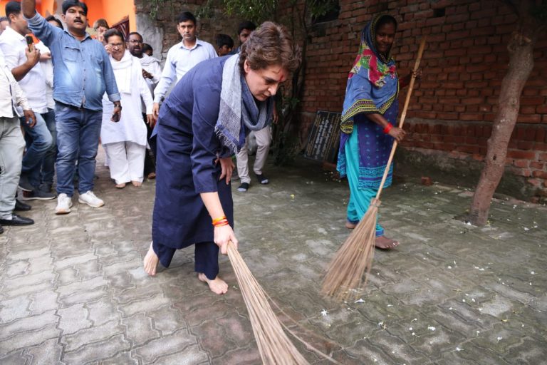 Surrounded by Congress workers with cameras, Priyanka Gandhi Vadra sweeps ground at Dalit locality in Lucknow