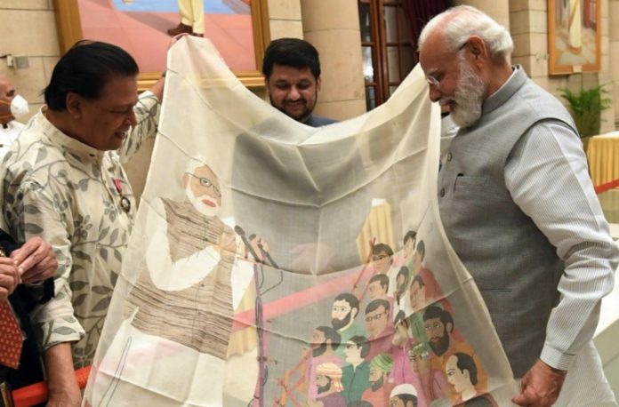 PM Modi thanks Padma Awardee Shri Biren Kumar Basak for a special gift