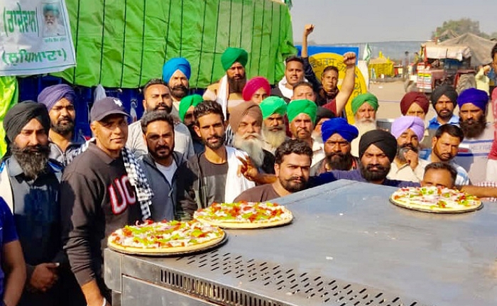 ‘Farmers’ at Singhu border organise ‘pizza langars’ to mark one year of protest, Rakesh Tikait says protestors will not budge from Delhi borders