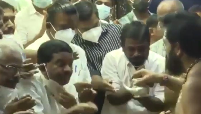 Kerala Devaswom Minister K Radhakrishnan uses Sabarimala temple holy water as hand sanitiser, draws criticism