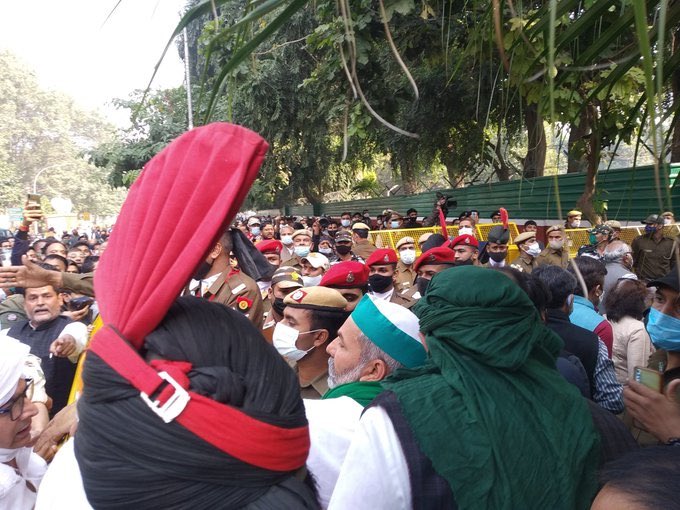 Crowd gathered outside Gen Rawat's residence protest against Rakesh Tikait