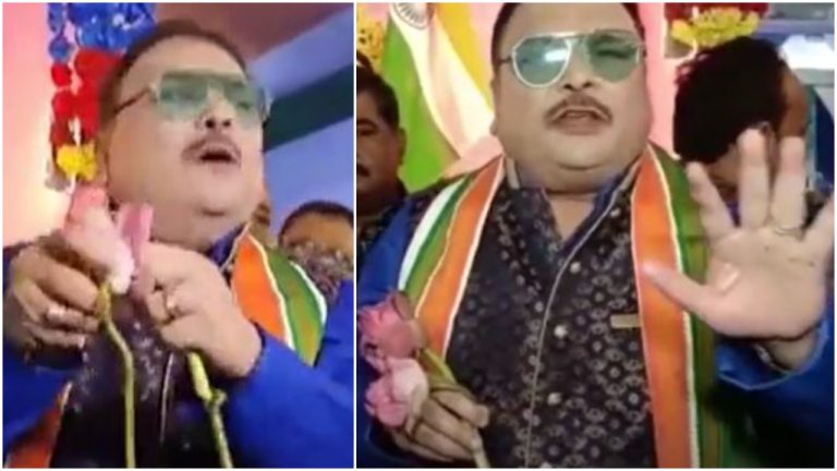 TMC’s Madan Mitra tears a lotus, says won’t offer to Maa Durga as it is BJP’s symbol: How Netizens are demanding action