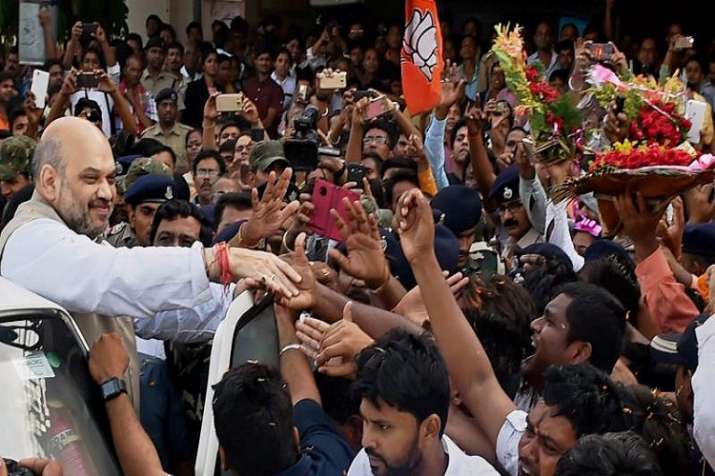 Home Minister Amit Shah campaigns door to door in Kairana ahead of UP Assembly elections, stresses on development model of Yogi Government