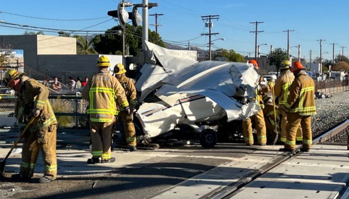 Plane lands on tracks, hit by speeding train