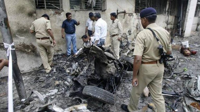 Gujarat court acquits 28 of the 77 accused from the 2008 Ahmedabad serial bomb blast case that killed 56 and left hundreds injured