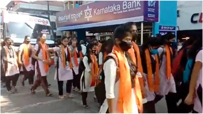Udupi girls protest against hijab in college, wear saffron shawls