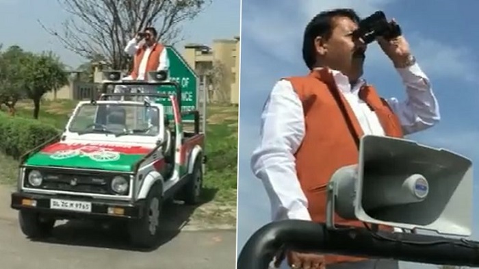 Uttar Pradesh: SP leader Yogesh Verma keeps a watch on EVM strong room with binoculars, leaves netizens amused