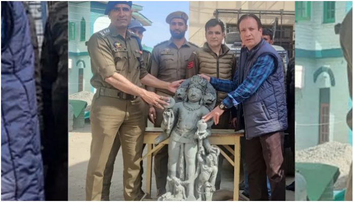 Four-headed ancient sculpture of Lord Vishnu recovered from river Jhelum