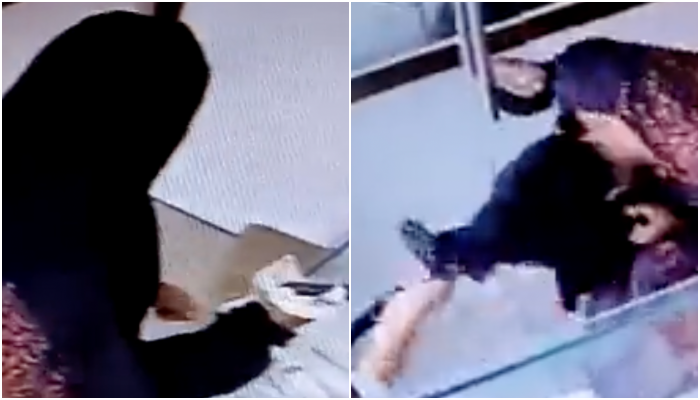 Watch: Hijab-clad woman tries to loot jewellery shop at gunpoint, shopowner drags her out holding hijab and hair