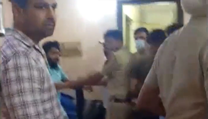 BJP’s Tajinder Bagga shares a new video which shows how men in civilian dress barged in with guns to arrest him earlier this month