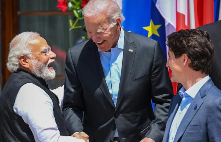 Joe Biden walks up to PM Modi to greet him as latter stands for a group picture with French President and the Canadian PM at the G7 Summit: Watch