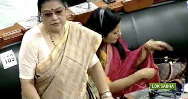 TMC MP Mahua Moitra seen hiding her Louis Vuitton bag worth Rs 1.6 lakh during price rise debate in parliament: Watch