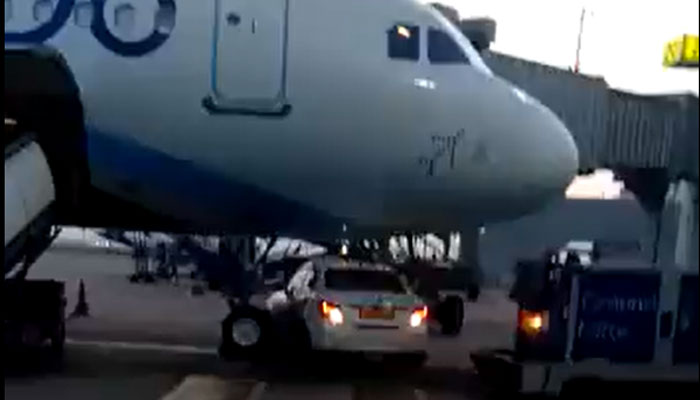Watch: Go First airlines car drives under IndiGo plane at Delhi airport, accident avoided by inches