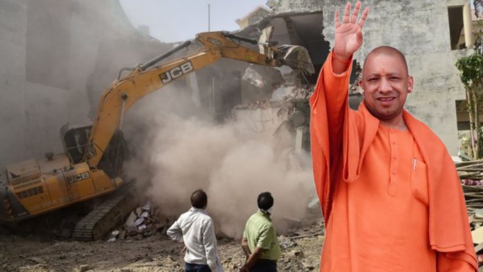 US senators got it completely wrong: Yogi's bulldozer is a symbol of strong action against the land mafia, not a symbol of 'hate'
