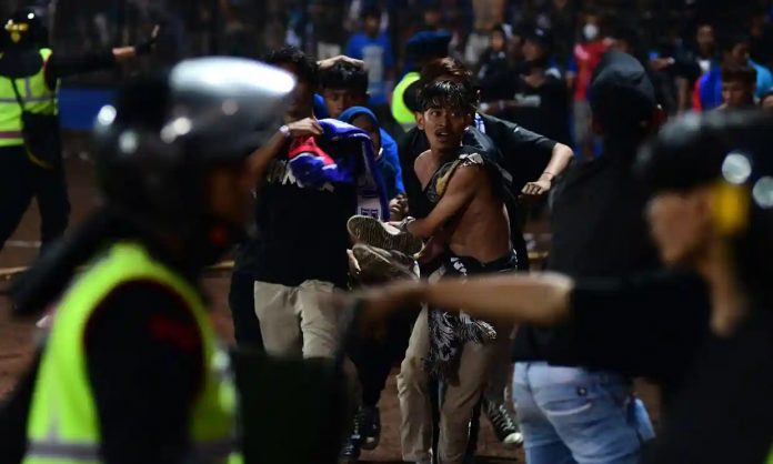 Indonesia: 129 dead as riot occurs in stadium after soccer match