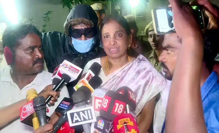 Rajiv Gandhi assassination convict Nalini Sriharan smiles to the camera as she steps out of prison along with her husband and 4 others