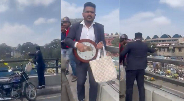 Bengaluru man who threw bundles of currency from the flyover booked and detained, denies charges of being mentally unstable