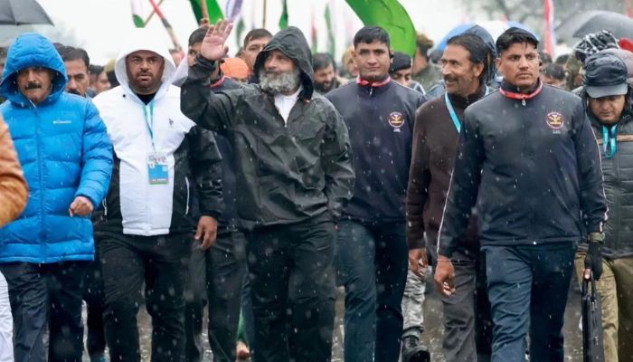 As Netizens and BJP question Rahul Gandhi for wearing a jacket in J&K after saying he is not scared of cold, Congress says it was a raincoat
