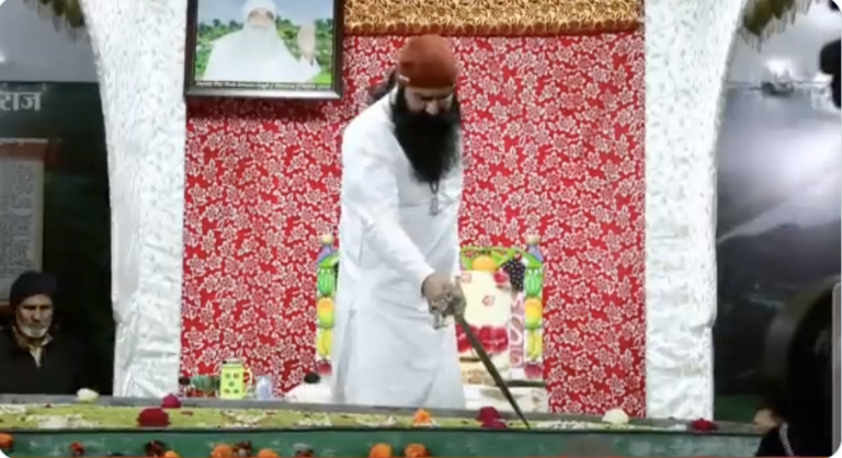 Gurmeet Ram Rahim Singh Insan of Dera Sacha Sauda cuts cake with a sword while out on parole, watch viral video