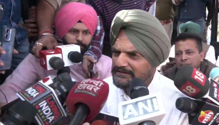 Balkaur Singh protesting outside Punjab Assembly