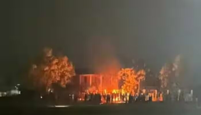 The belligerent group set fire to the gym.