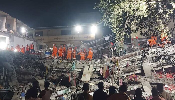 NDRF personnel perform rescue operations in Thane following the building collapse.
