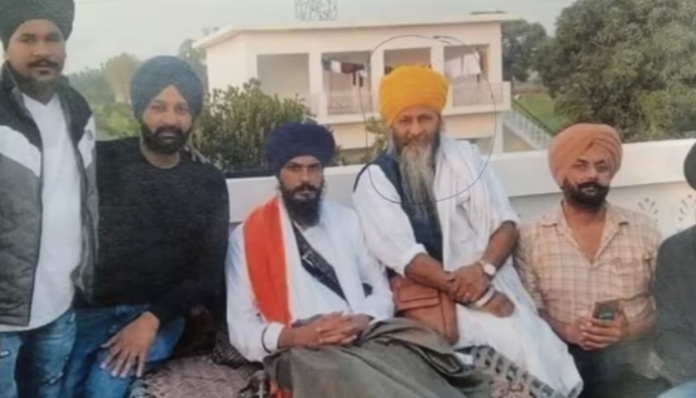 Alongside Amritpal Singh and others is Joga Singh (wearing a yellow turban).