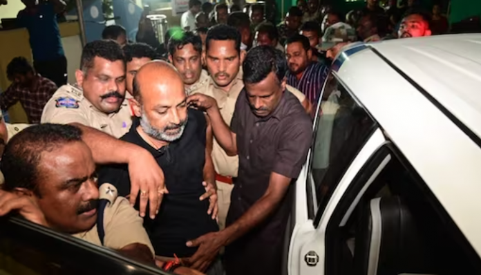 The police are taking the BJP Telangana chief into custody.
