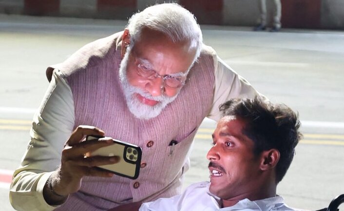 Read more about the article PM Modi wins hearts as he clicks a ‘special selfie’ with a wheelchair bound BJP worker
