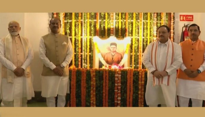 PM Modi pays tribute to Veer Savarkar with other Parliamentarians.