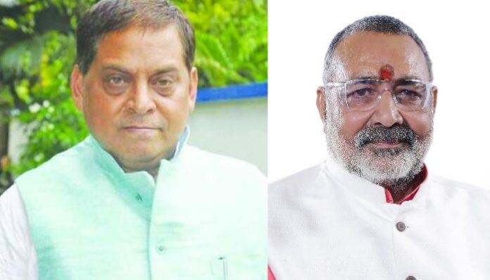 Giriraj Singh (right), Neeraj Kumar (left)