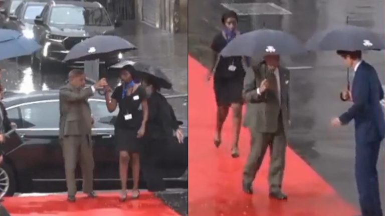 Paris: Pakistan PM Shehbaz Sharif walks the red carpet after snatching an umbrella from a female officer, leaving her drenched in rain