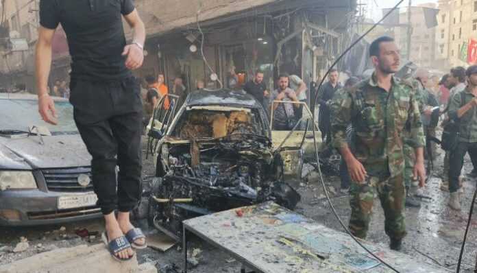 An explosive device placed in a vehicle exploded near the Sayeda Zeinab shrine.