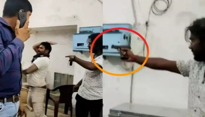 A miscreant threatening and pointing a pistol at govt employee.
