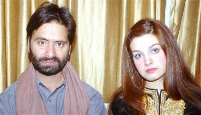 The Kashmiri separatist leader and terrorist with his Pakistani wife.