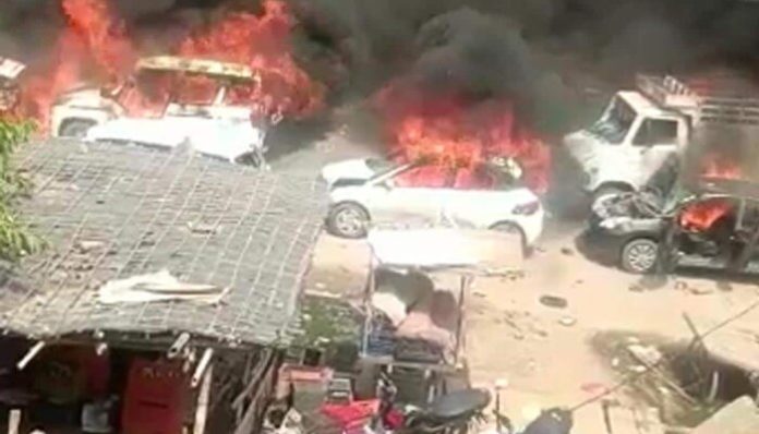 Vehicles were set on fire in Gurugram's Sohna Chowk after the unrest spread from Nuh district.