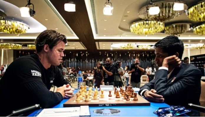 Magnus Carlsen (L) defeated Praggnanandhaa (R) in the FIDE World Cup Chess Final.