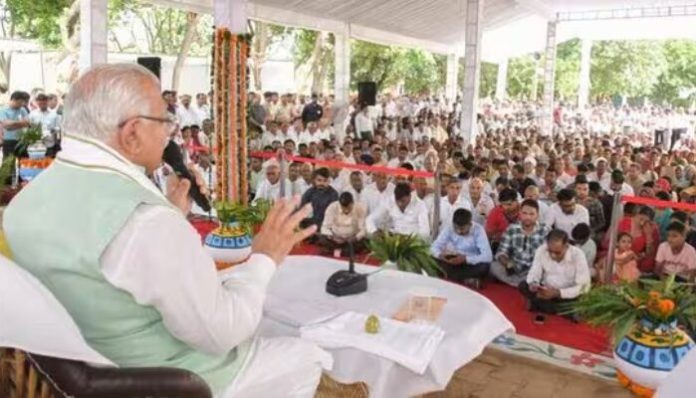 The CM addressing people during 