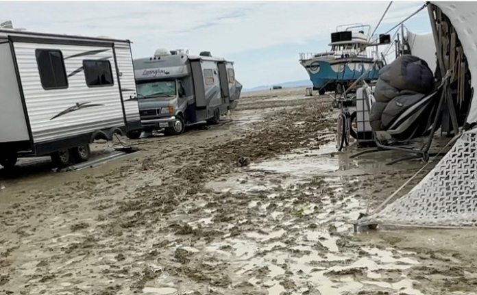 One dead, 70000 stranded at the Burning Man festival in the US after massive floods; toilets unclean, ingress, egress prohibited