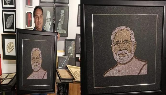 PM Narendra Modi's diamond portrait and architect Vipul Jepiwala.