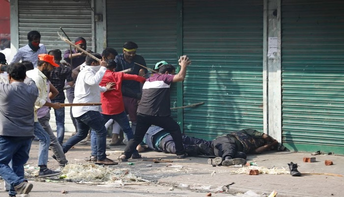 Bangladesh opposition protest turns violent as supporters clash with police amid calls for PM to resign, 1 cop killed