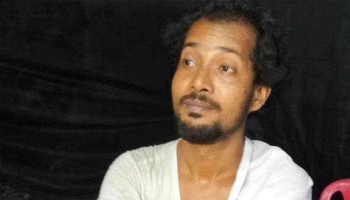 Shah Alam was arrested by the police after he was caught with bag full of Islamic text and Quran copies at a Puja Mandap