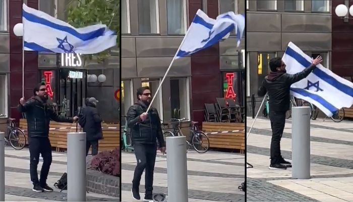 Sweden: Activist Salwan Momika, who had earlier burnt Quran, now steps on Quran and waves Israeli flag in front of Islamists
