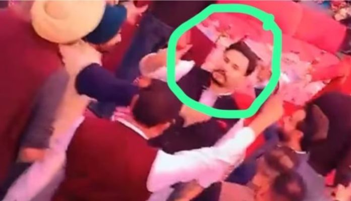 Lucky Sandhu dancing in a wedding party