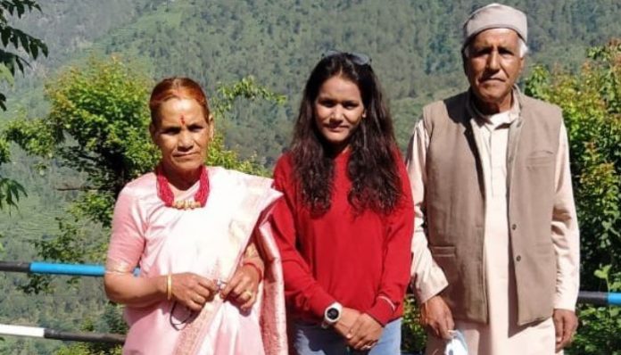 Savita Kanswal with her parents