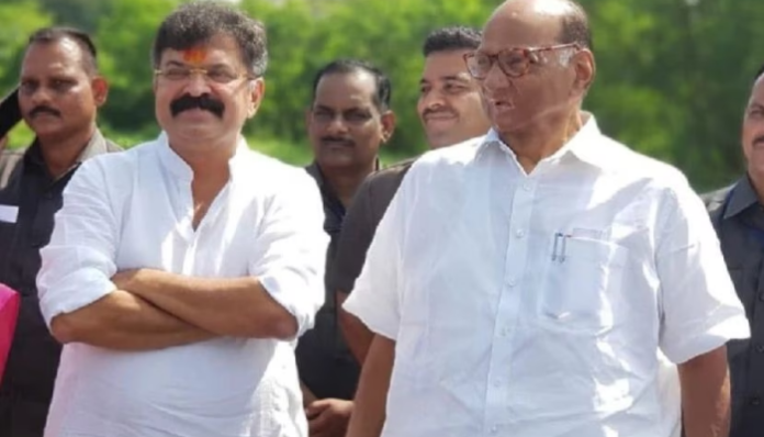 Jitendra Awhad and Sharad Pawar.