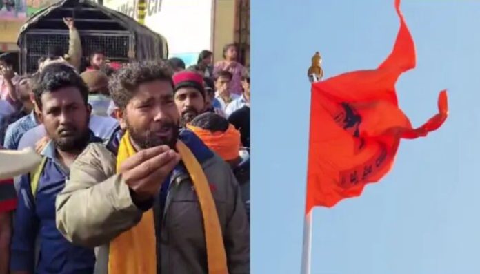 People protest over removal of Hanuman flag.