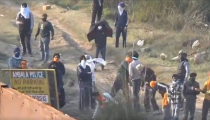 Pelting stones, brandishing swords and more: ‘Farmers’ attack police in the garb of ‘protests’, abuse and threaten them on camera